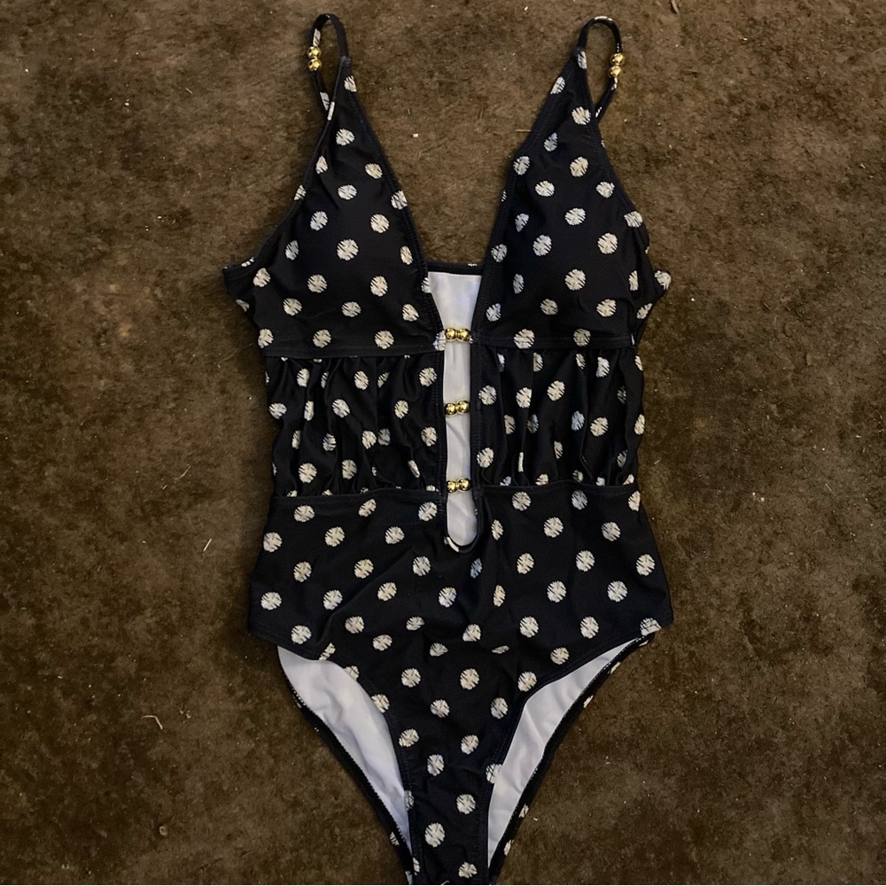 New with tags women’s one piece, Black and White Polka Dot Swimsuit size small..